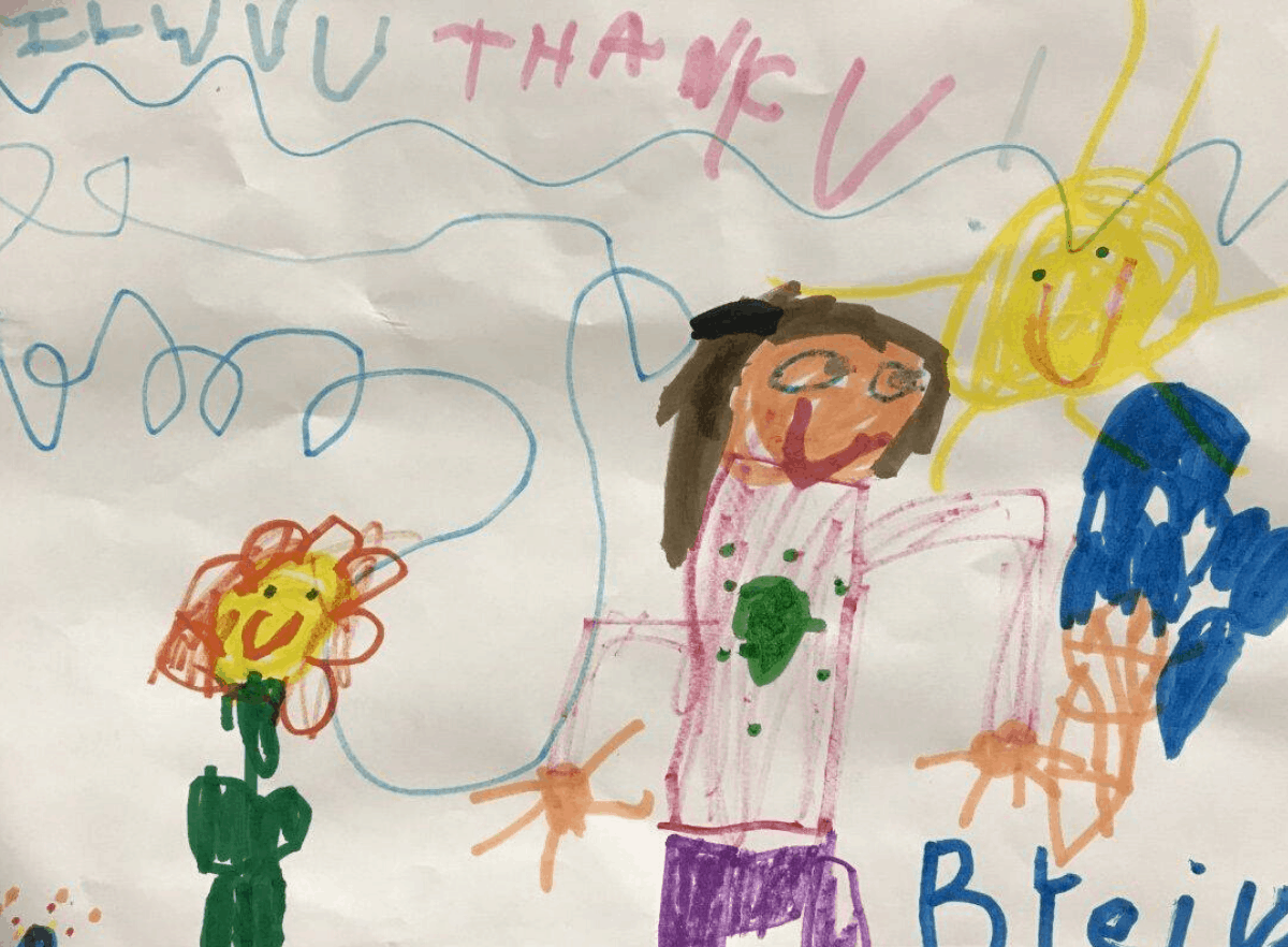 Children drawing of human and flower