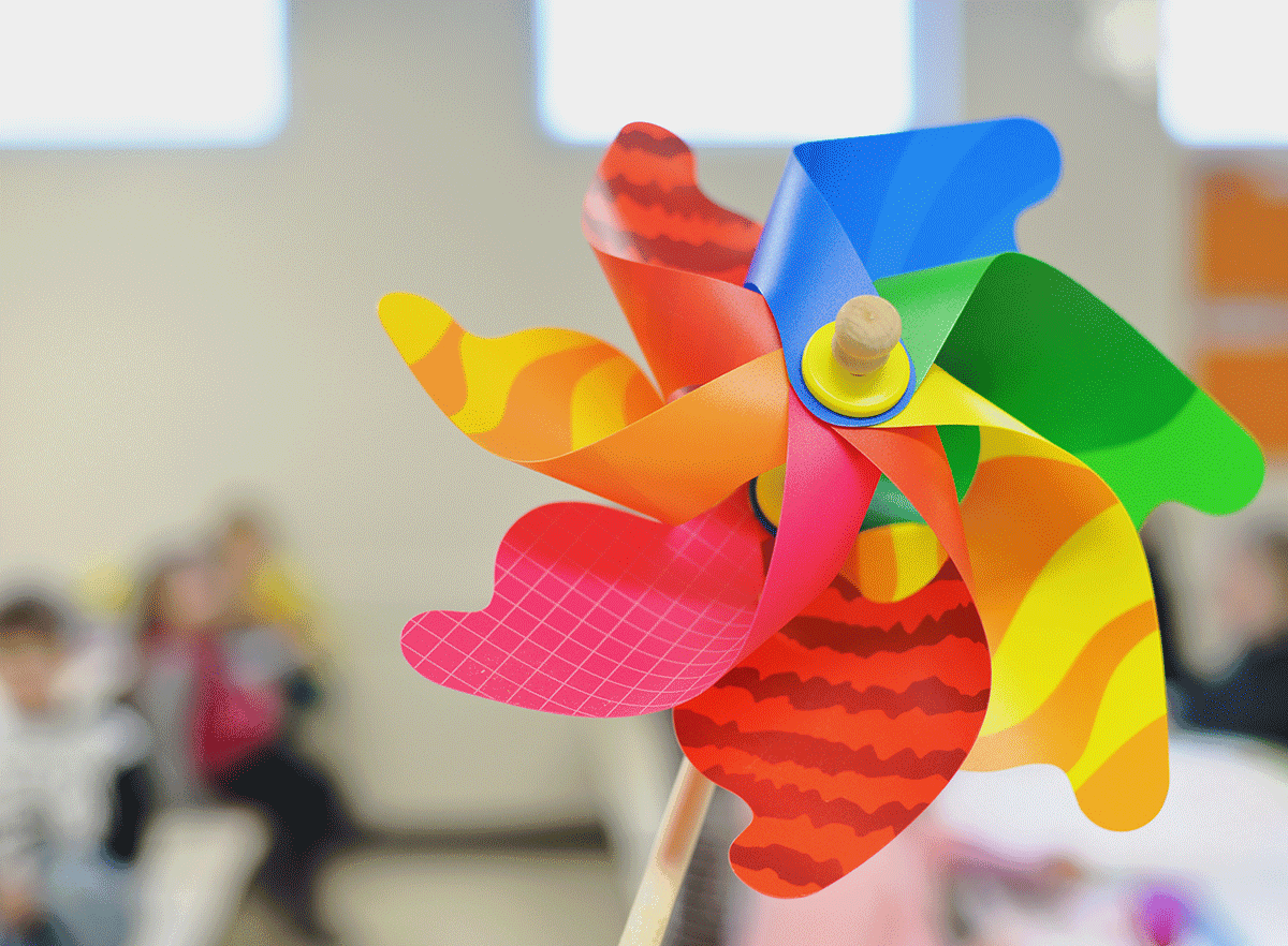 Pinwheel with blurred background of a classroom